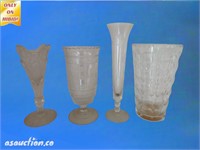 Four large cut glass vases