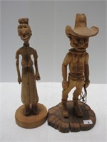 2 CAIRNS WOODEN FIGURES