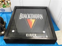 SHADOW BOX WITH BLACK TIN ADVERTISING SIGN