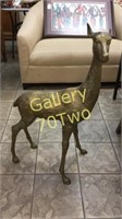 Large brass dear approximately 38 inches tall by