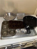 muffin pans, cake pans and enamel roaster