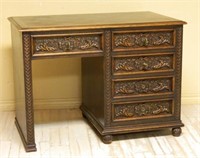 French Acanthus and Foliate Carved Oak Desk.