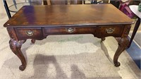 Table desk by Broyhill - highly carved legs and