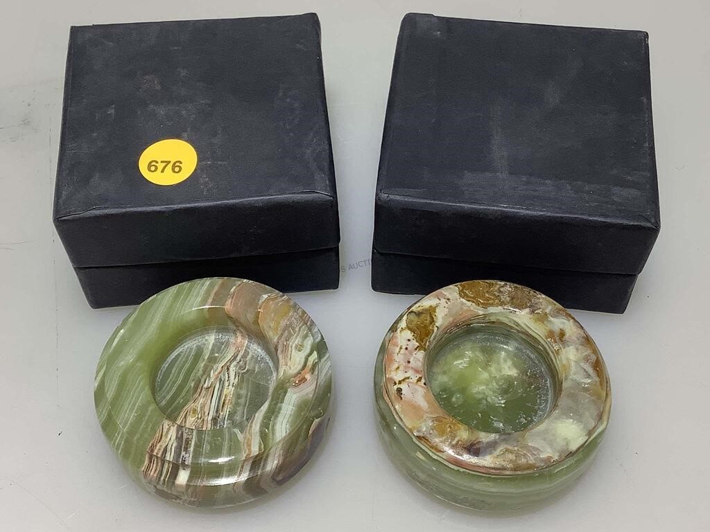 2 carved Onyx candle holders.