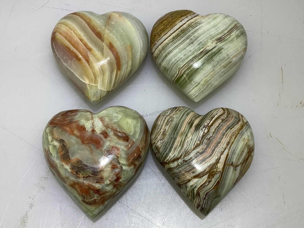 4 Onyx fetish hearts.
