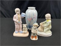 Lot of porcelain pastel figurines and vase.