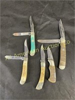 Five Frost cutlery knives, various configurations