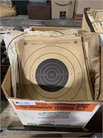 Box of vintage paper shooting targets & Revolver