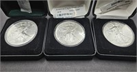 3 2015 silver American Eagle dollars,