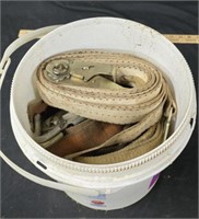 Bucket of ratchet straps