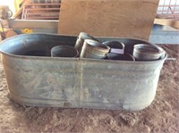 Large water trough (condition unknown) & 5 gal