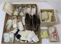 Lot of vintage baby shoes, bonnets, mittens and