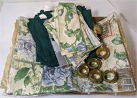 Flat of napkins, napkin holders and place mats
