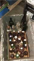 Bin with 33 collector bottles no bin