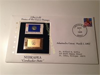 Collection - 22k gold Nebraska stamp, 1973