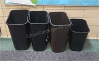 Plastic trash cans.