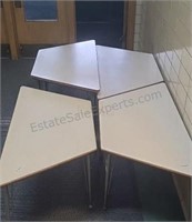 Trapezoid shaped tables.