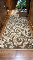 Brown rug 10 1/2 x 32 1/2