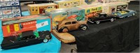 4 Vintage assembled model cars with original boxes