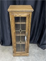 SMALL OAK CABINET WITH LEAD GLASS DOOR