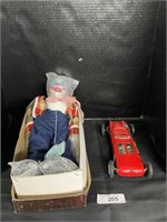 Porcelain Clown Doll & Tin Race Car.