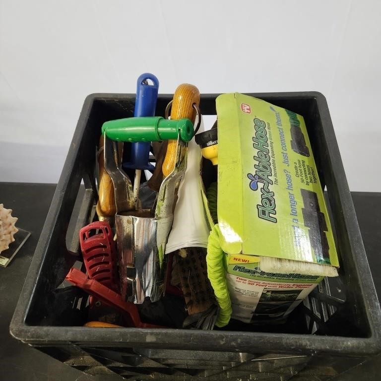 Crate of assorted yard tools