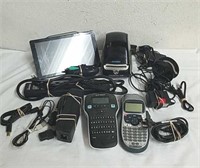 Group of label makers, a power strip, and other
