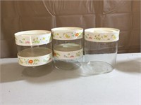 Glass canisters with plastic twist lids