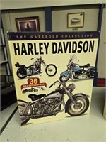 Harley-Davidson books and Coca-Cola collectible
