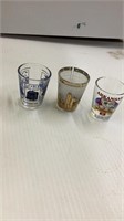 Set of five 7 up glasses, misc shot glasses, and