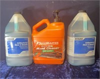 Hand Sanitizer and orange clean bottles