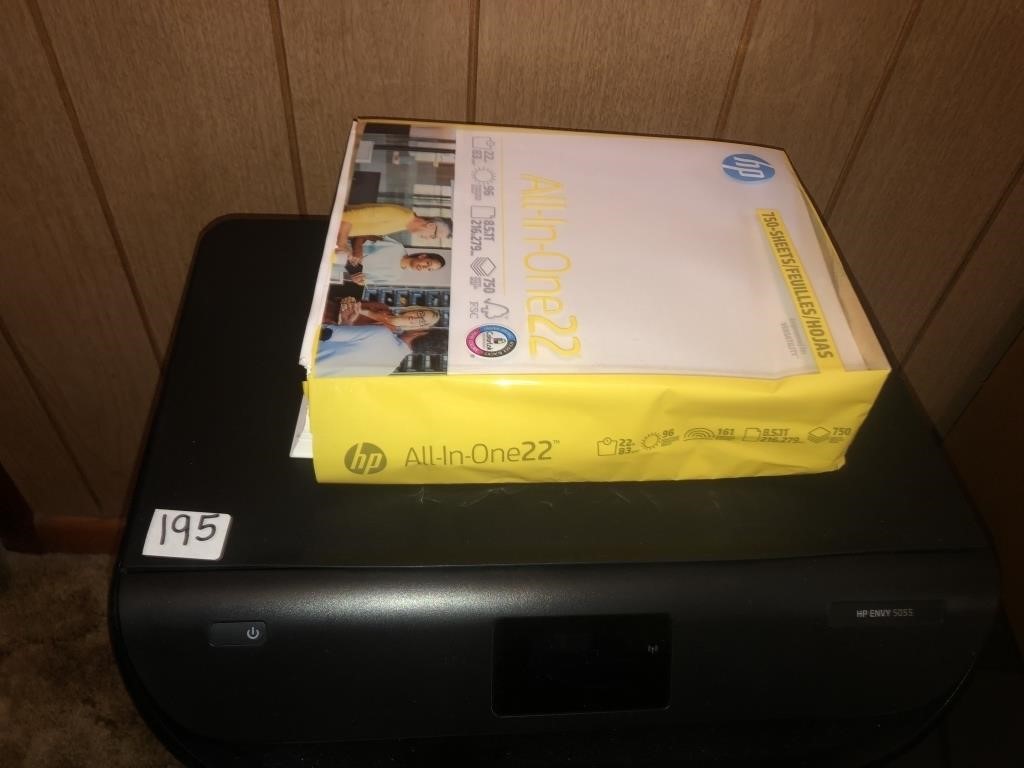 HP Envy printer with paper *opened