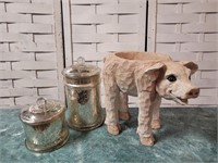 Glass canisters and wood pig