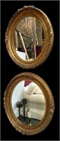 Matched Pair of Carved Gold Gilt Wall Mirrors.