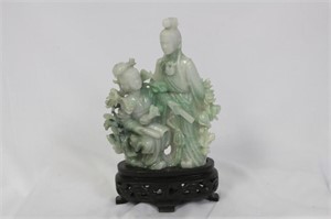 A Chinese Jadeite Statue on Stand