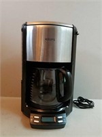 Silver and Black Krups Coffee Pot.