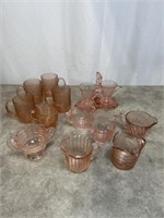 Pink colored glass mugs, sugar and creamer sets,