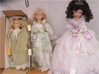 3 Porcelain Dolls 25" high is the tallest