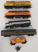 Lot of train engines and cars that includes Life