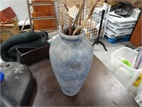 Clay vase with straw
