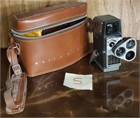 C - VINTAGE BELL & HOWELL CAMERA W/ CASE (S)