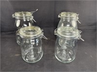 4 Various size Glass canisters