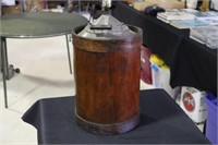 5 Gal tin and wood covered oil jug with bail