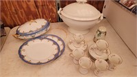 Serving dishes and platters and teacups.Lot