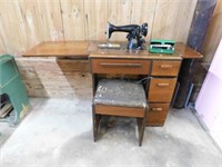 Electric Singer Sewing machine model 15-90 in oak