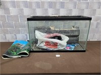 Fish tank with supplies