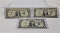 3 1957A $1 silver certificates