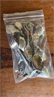 Lot of small spoons and forks