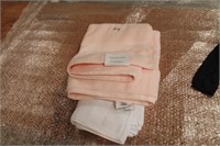 New Calvin Klein pink towel and other white hand