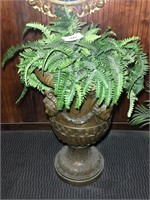 Metal planter with faux plant.25x36 inches